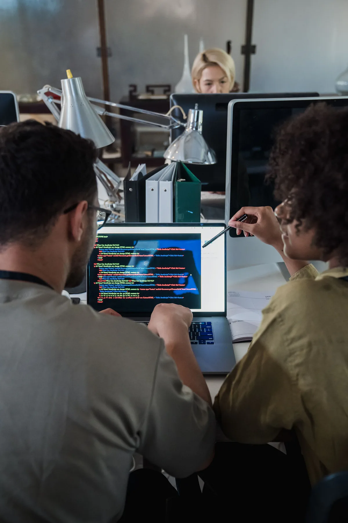 Developers working together on software.